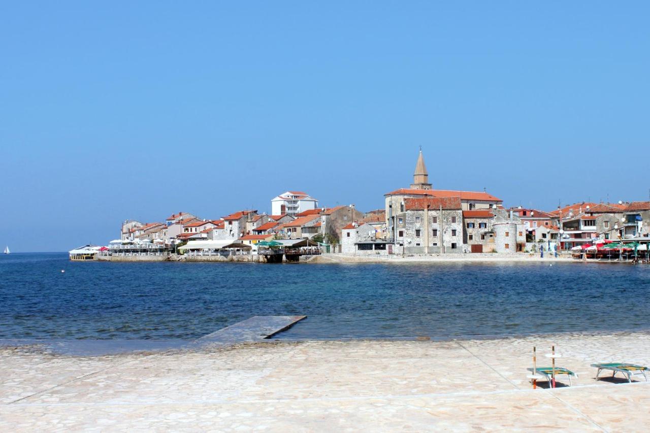 Apartments With A Parking Space Umag - 7066 Bagian luar foto